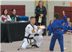 Young Martial Artist About to Break a Board