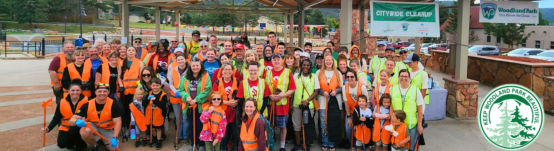 Keep Woodland Park Beautiful Committee - image of large group of people in safety vests at cleanup